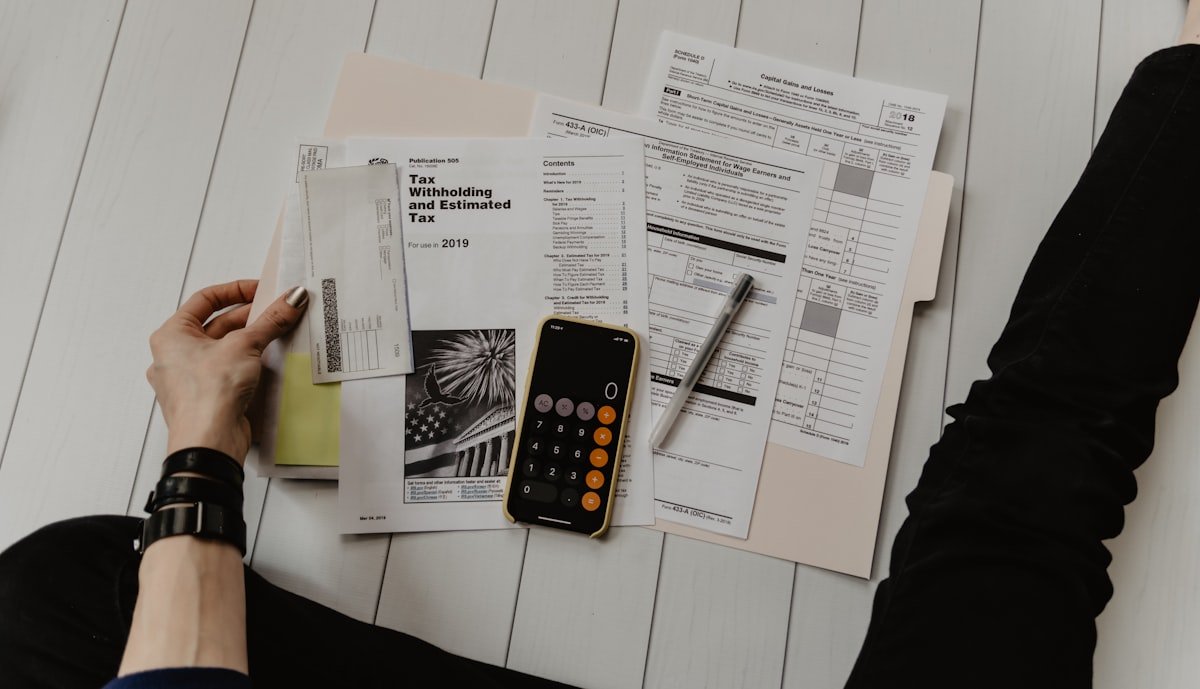 Calculator and ledgers for revenue report auditing